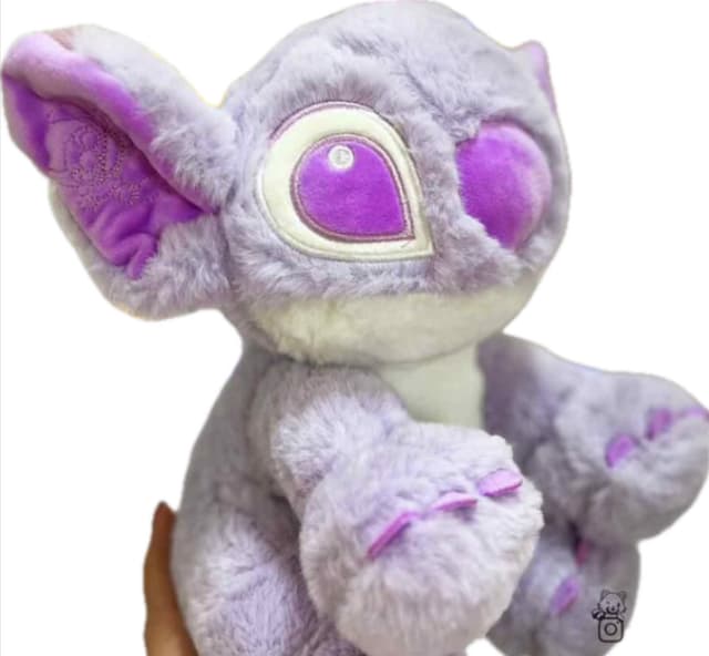 عروسک استیچ بنفش